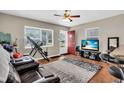 Cozy living room featuring lots of natural light and wood-look flooring at 427 5Th Nw St, Largo, FL 33770