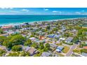 Charming coastal neighborhood with beach access and lush trees, offering a serene and picturesque setting at 119 13Th Ave, Indian Rocks Beach, FL 33785