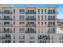 Beachfront condo building with floor-to-ceiling windows and spacious balconies and ocean views at 15 Avalon St # 601, Clearwater Beach, FL 33767