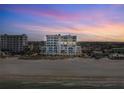 Stunning beachfront condo building offers luxurious coastal living and beautiful sunset views at 15 Avalon St # 601, Clearwater Beach, FL 33767