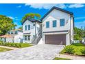Attractive two-story home with a front-facing garage and a well-maintained yard at 1741 Nevada Ne Ave, St Petersburg, FL 33703