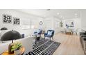 Bright, modern living room featuring neutral walls, recessed lighting and stylish furnishings at 2117 S West Shore Blvd, Tampa, FL 33629