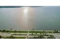 Scenic aerial view of the waterfront featuring clear waters and a paved shoreline at 2308 W Jetton Ave, Tampa, FL 33629
