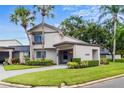 Charming townhome with well-maintained lawn and landscaping, neutral toned stucco and room for parking at 2646 Barksdale Ct, Clearwater, FL 33761