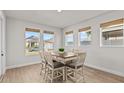 Cozy dining area with natural light and seating for six at 28889 Orange Berry # Dr, Wesley Chapel, FL 33543
