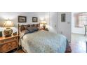 Cozy bedroom with a decorative headboard and side tables, offering a comfortable and inviting space at 5347 81St N Ln # 25, St Petersburg, FL 33709