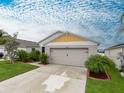 Attractive single-Gathering home with a two-car garage and well-maintained lawn at 12635 Tannencrest Dr, Riverview, FL 33579