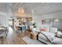 Cozy living space featuring an open floor plan connecting the kitchen and living area at 24862 Us Highway 19 N # 1701, Clearwater, FL 33763