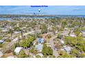 An aerial view shows the house with its proximity to the bay and downtown St Pete at 4227 Porpoise Se Dr, St Petersburg, FL 33705