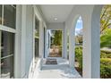 Arched entryway with view of manicured landscaping provides a welcoming entrance at 5305 Sagecrest Dr, Lithia, FL 33547
