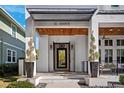 Stately covered entrance featuring modern design elements and manicured landscaping that offers curb appeal at 145 16Th Ne Ave, St Petersburg, FL 33704