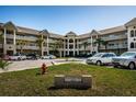 Waterford community with a well-maintained facade, prominent signage, and lush landscaping at 2019 Utopian W Dr # 310, Clearwater, FL 33763