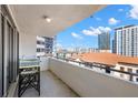 Cozy balcony featuring director's chairs with city views, offering a relaxing outdoor space at 470 3Rd S St # 814, St Petersburg, FL 33701