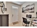 Office nook area features decor, black and white wall art, gray cabinet and tile flooring at 708 Barclay Wood Dr, Ruskin, FL 33570