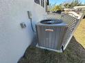 Lennox air conditioning unit provides efficient cooling, complemented by a clean exterior wall at 1913 Park Ave, Tarpon Springs, FL 34689