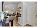 Open foyer with views into the living room and kitchen, featuring light floors and a bright interior at 592 Deer W Run, Palm Harbor, FL 34684