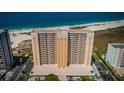 Stunning aerial view of beachfront condo complex, boasting easy beach access at 1270 Gulf Blvd # 506, Clearwater Beach, FL 33767