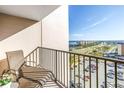 Condo balcony features a view of the waterway, beaches and resident parking lot at 5220 Brittany S Dr # 1403, St Petersburg, FL 33715