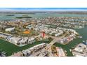 Aerial view showing waterfront property nestled in a beautiful community, with easy access to the ocean at 11650 Capri S Cir # 203, Treasure Island, FL 33706