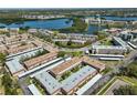 Aerial view of condo complex with lake views and mature landscaping in desirable location at 10038 62Nd N Ter # 21, St Petersburg, FL 33708
