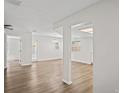 Bright and airy living room with new flooring and lots of natural light at 18406 Sterling Silver Cir, Lutz, FL 33549