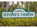 Landscaped community entrance sign for Condominiums at Stone's Throw at 6826 Stones Throw N Cir # 11104, St Petersburg, FL 33710