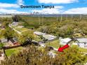 Aerial view of property near Downtown Tampa, highlighting the surrounding neighborhood and lush greenery at 4509 26Th S Ave, Tampa, FL 33619