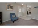 Cozy living room with carpet, modern furniture, and bright natural light at 1701 Brigadoon Dr, Clearwater, FL 33759
