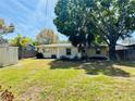 Spacious backyard featuring mature trees at 619 41St Ne Ave, St Petersburg, FL 33703