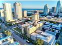 Scenic aerial view of a building featuring a nearby street and ocean in the distance at 130 4Th N Ave # 315, St Petersburg, FL 33701