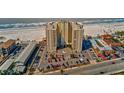 Beautifully landscaped grounds, parking, and ocean views surround the building at 3820 Gulf Blvd # 802, St Pete Beach, FL 33706