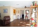 Inviting living room featuring hardwood floors and neutral paint, creating a cozy atmosphere at 408 Gloucester Blvd # 33, Sun City Center, FL 33573