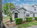 Cozy single-story home with manicured bushes and a well-kept lawn at 5100 Burchette Rd # 500, Tampa, FL 33647
