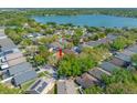 Beautiful aerial view of a lakeside community with mature trees and well-maintained homes at 7116 Colony Pointe Dr, Riverview, FL 33578