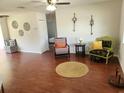 Inviting living room with wood flooring and cozy seating, perfect for relaxing and entertaining at 337 Shore E Dr, Oldsmar, FL 34677