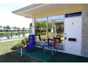 Inviting patio with a tranquil water view, perfect for relaxing outdoors and enjoying the scenery at 4338 Tahitian Gardens Cir # H, Holiday, FL 34691