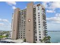 Spacious condo building with bay views, private balconies, and convenient covered parking at 7300 Sun Island S Dr # 1705, South Pasadena, FL 33707