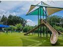 Colorful playground with slides and play equipment, perfect for Gathering fun at 127 81St Ne Ave, St Petersburg, FL 33702