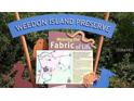 Weedon Island Preserve sign with trail map and information about the local ecosystem at 127 81St Ne Ave, St Petersburg, FL 33702