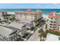 Beautiful beachside community with stunning architecture, lush landscaping, and ocean views at 19 Somerset St, Clearwater Beach, FL 33767
