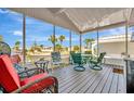 Relaxing screened porch offers ample seating with views of the surrounding community at 328 S Port Royal Ln, Apollo Beach, FL 33572