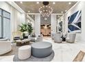 Spacious lobby with stylish seating, artwork, and contemporary lighting fixtures at 301 1St S St # 1206, St Petersburg, FL 33701