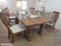 Traditional dining room boasts a solid wood table, ideal for Gathering meals at 5425 Leisure St, Dade City, FL 33523