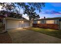 Charming single-story home with brick accents, light blue siding, and a well-maintained front yard at 910 Edgedale Cir, Brandon, FL 33510