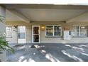 Exterior front entrance featuring unit numbers and mailboxes on a bright day at 426 32Nd N Ave # 102E, St Petersburg, FL 33704