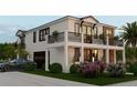 Modern home with a two-car garage, balcony, and lush landscaping at 5000 Chancellor Ne St, St Petersburg, FL 33703