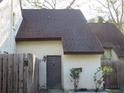 Charming exterior of the townhouse with a brown door and matching brown roof at 12611 Touchton Dr # 122, Tampa, FL 33617