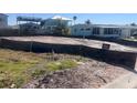 Vacant lot ready for building with utilities available and desirable neighborhood close to beach at 842 180Th E Ave, Redington Shores, FL 33708