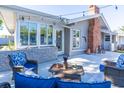 Comfortable patio area with stylish seating, perfect for outdoor relaxation and entertaining at 2096 Church Creek Pt, Largo, FL 33774
