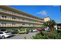Exterior shot of building with parking in front at 5725 80Th N St # 107, St Petersburg, FL 33709